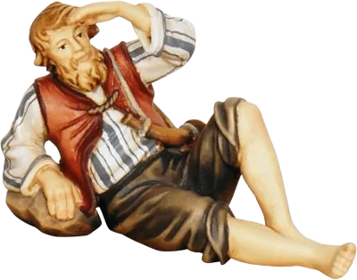 Hand-carved wooden shepherd figure lying down, wearing striped shirt and brown vest, hand-painted