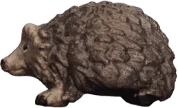Hand-carved wooden hedgehog nativity animal, brown with textured spines