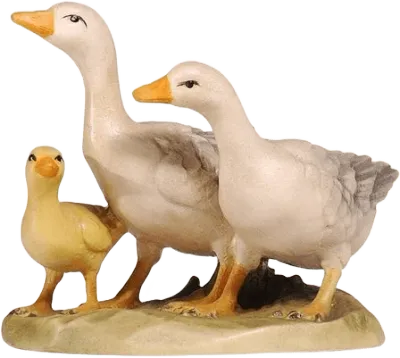 Hand-carved and hand-painted wooden group of three geese on a base, two white and one yellow