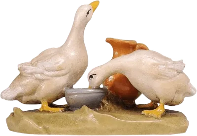 Hand-carved wooden figure of two white ducks with yellow beaks and feet, a jug and bowl on a base