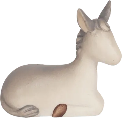 Hand-carved and hand-painted wooden donkey figure lying down with subtle shading