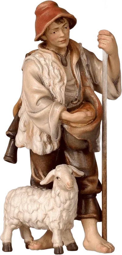 Hand-carved wooden herdsman figure holding hoe with sheep at feet, painted in earth tones