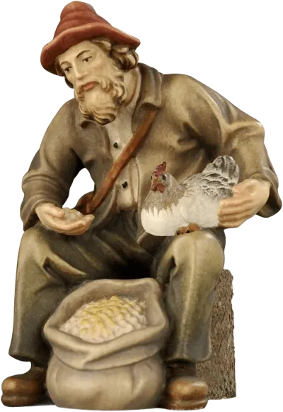 Hand-carved wooden shepherd sitting with hen, holding grain, painted in natural colors