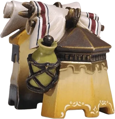 Hand-carved wooden luggage for elephant with painted yellow base, rolled cloths, and green jug