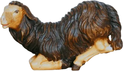 Hand-carved wooden dark brown sheep kneeling with light face and legs, hand-painted