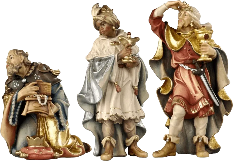 Hand-carved and hand-painted wooden Three Kings figures in colorful robes holding gifts