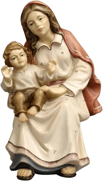 Hand-carved and hand-painted wooden shepherdess sitting with child in cream and brown clothing