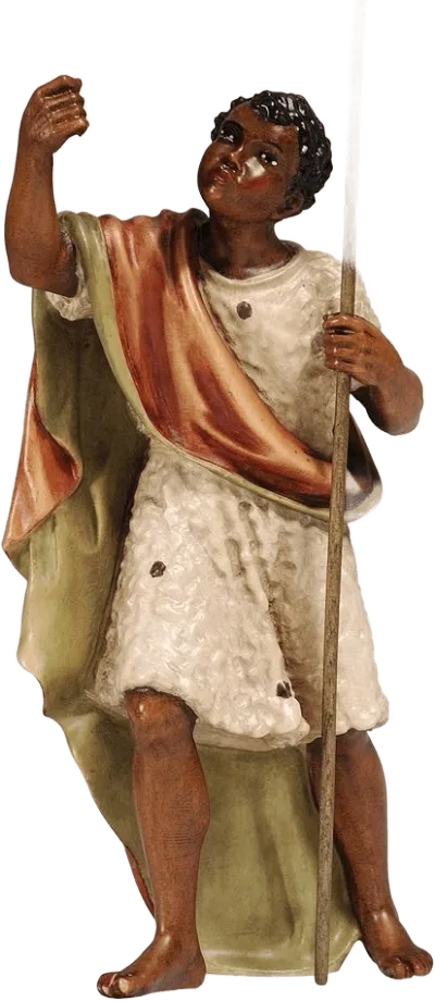 Hand-carved wooden Camel Driver figure holding a spear, painted in earthy tones with detailed robes