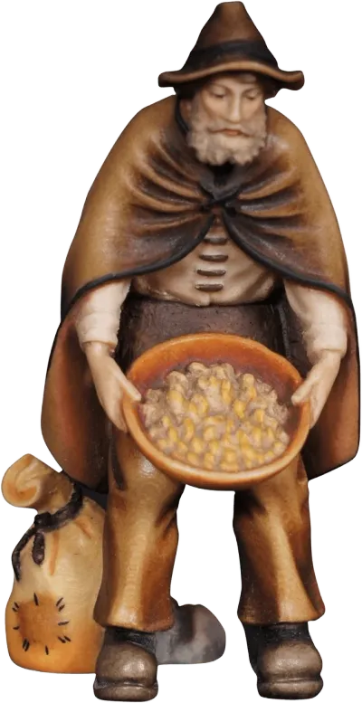 Hand-carved wooden shepherd figure feeding animals with bowl and sack, painted in brown tones